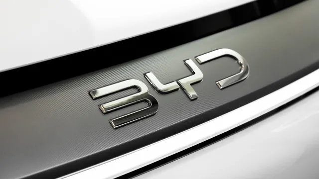 Close-up of the BYD emblem on a vehicle.